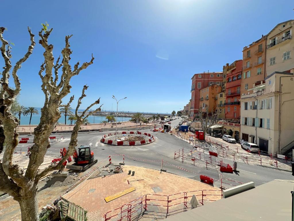 a view of a street in a city at MENTON # MONACO - F1 GP - 4 PERSONS - SEA VIEW - NEW - PARKING - CLIM - PREMIUM - BEACH and SUN in Menton