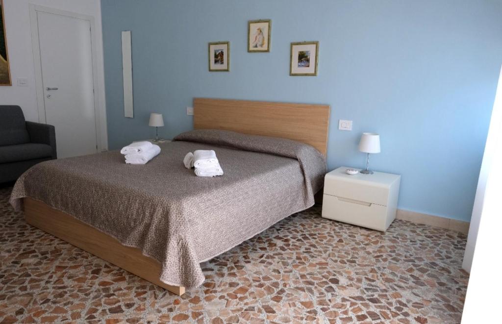 Postel nebo postele na pokoji v ubytování Sole & Luna Guest House