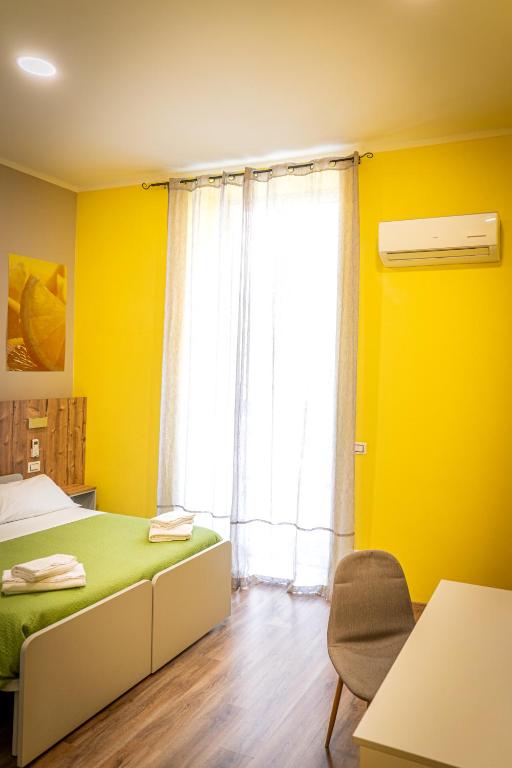 Postel nebo postele na pokoji v ubytování i sapori del levante