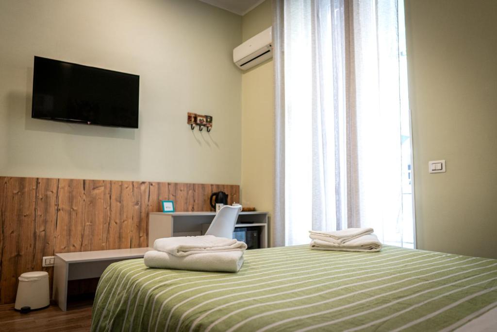 Postel nebo postele na pokoji v ubytování i sapori del levante