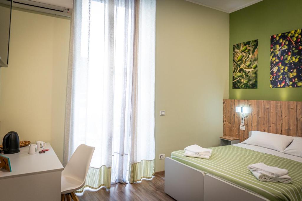 Postel nebo postele na pokoji v ubytování i sapori del levante