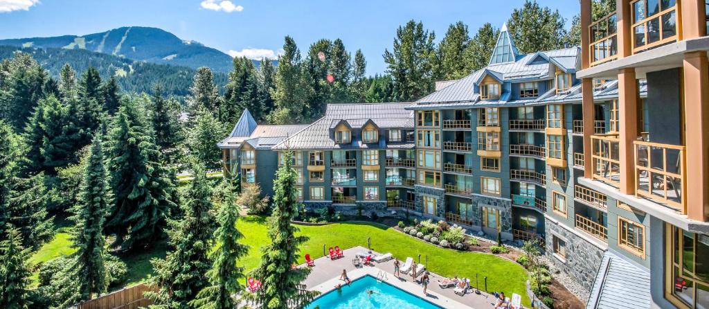 an aerial view of a resort with a pool at Cascade Lodge in Whistler