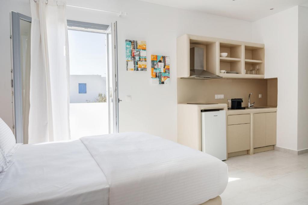 Kuchyň nebo kuchyňský kout v ubytování Bedspot Apartments Paros
