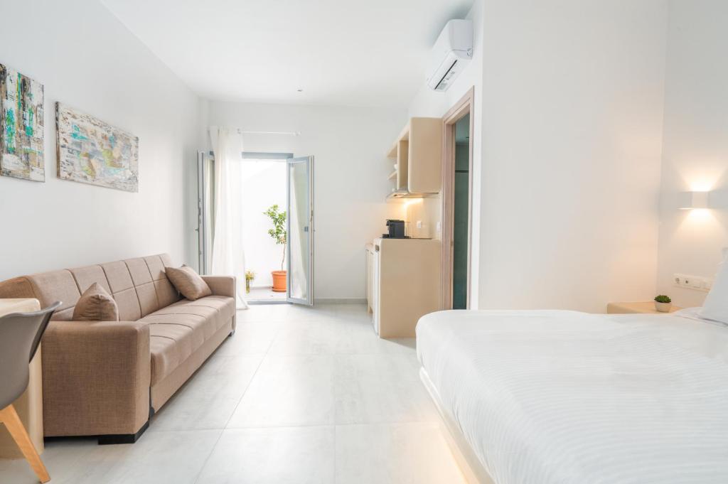 Postel nebo postele na pokoji v ubytování Bedspot Apartments Paros