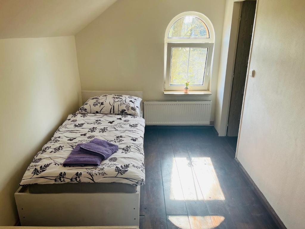 Postel nebo postele na pokoji v ubytování Apartmány 68