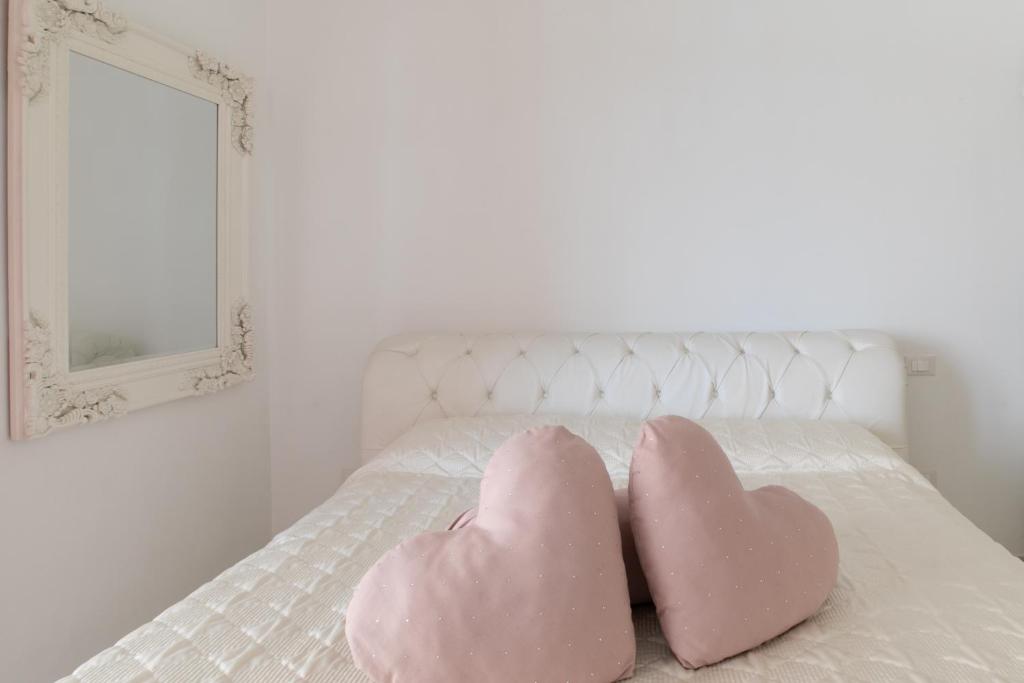 A bed or beds in a room at Suite vista mare