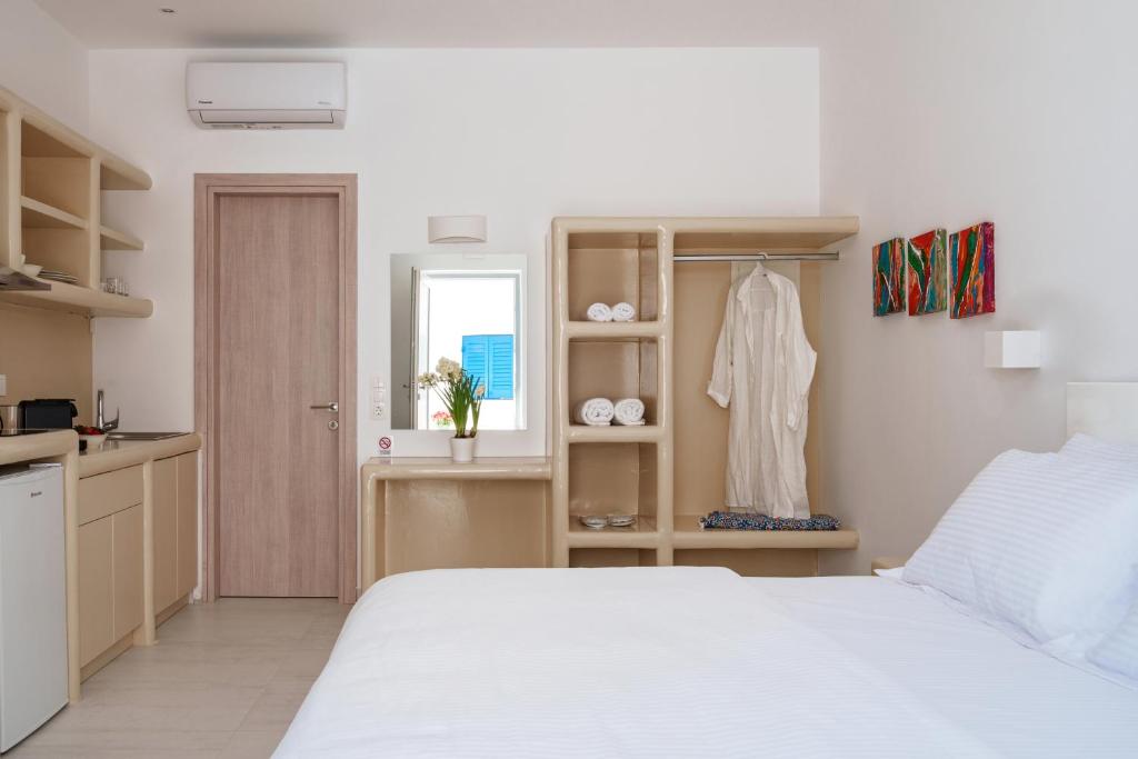 Postel nebo postele na pokoji v ubytování Bedspot Apartments Paros