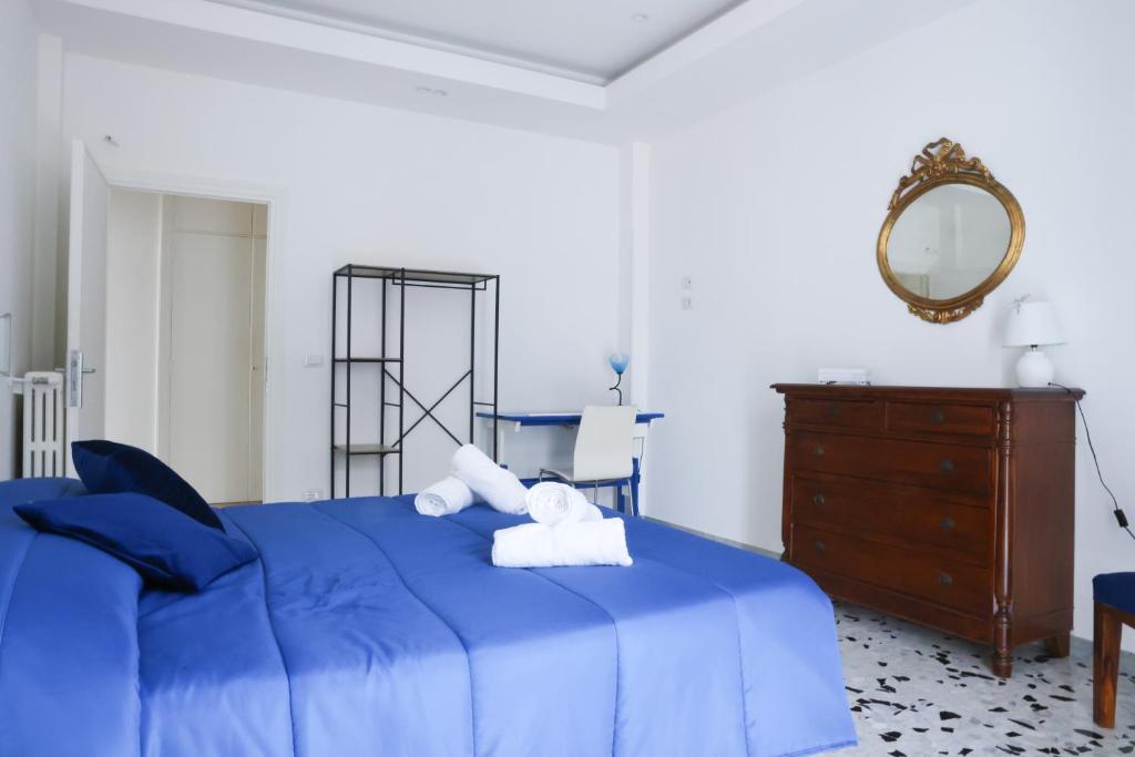 A bed or beds in a room at Attico vista mare