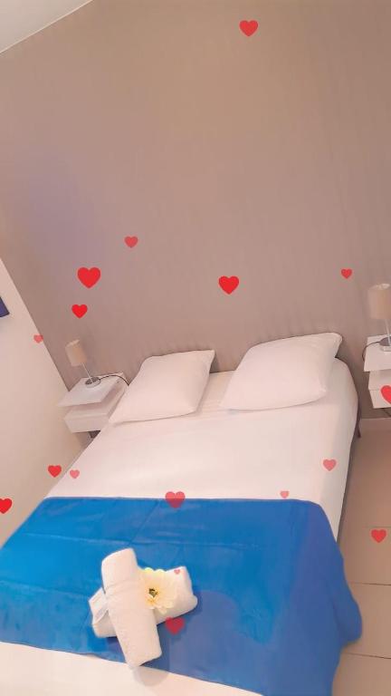 Postel nebo postele na pokoji v ubytování HOTEL LE CHANNEL