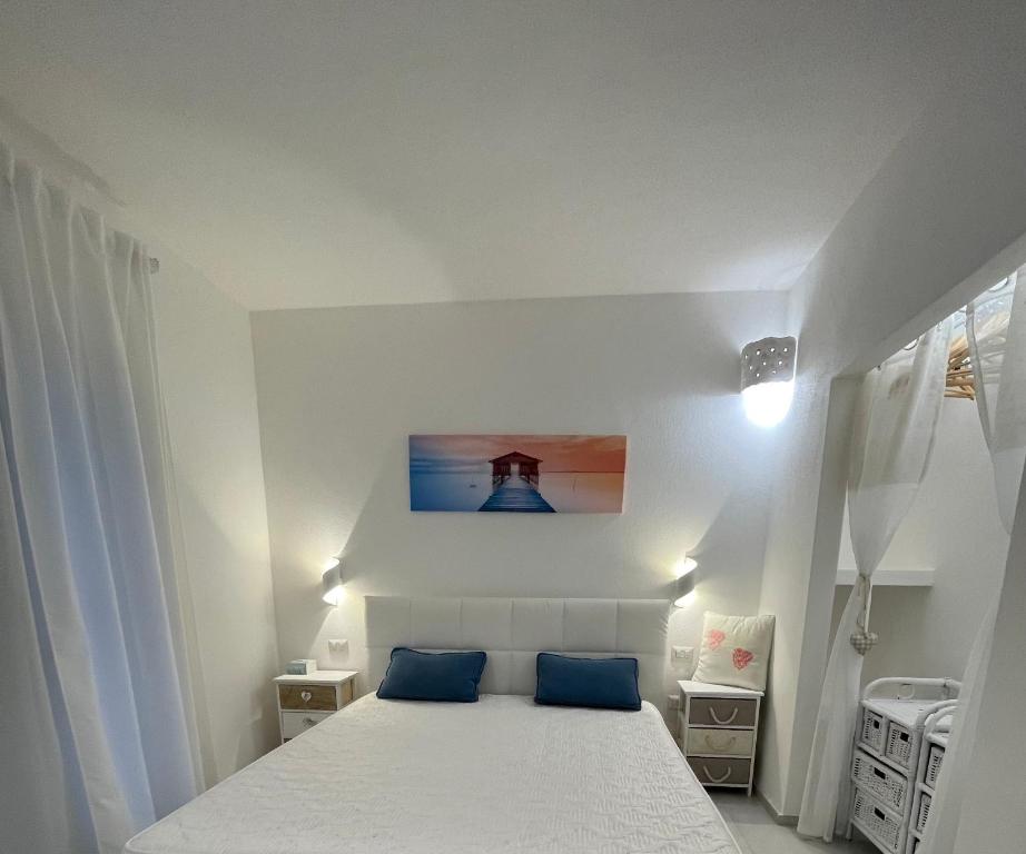 Łóżko lub łóżka w pokoju w obiekcie Villa GEGI