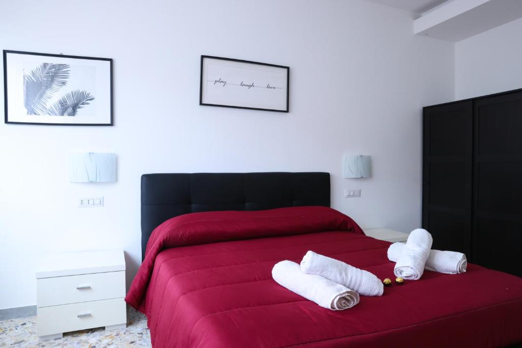 A bed or beds in a room at Attico vista mare