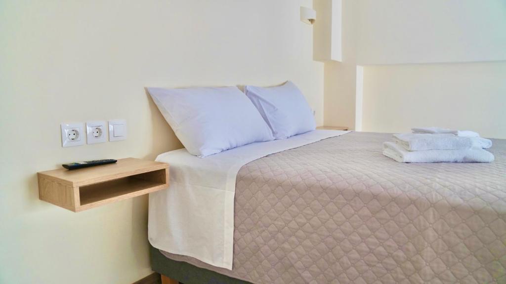 Postel nebo postele na pokoji v ubytování Piraeus Relax