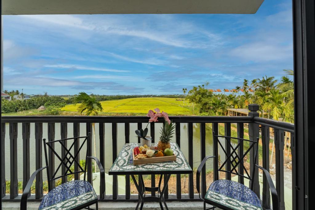 Balkón nebo terasa v ubytování Nghé Garden Resort Hội An