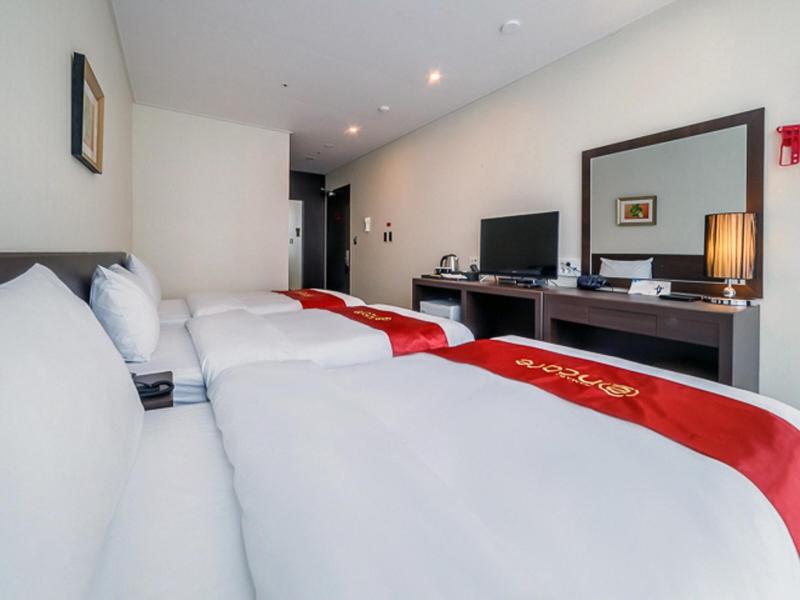 Postel nebo postele na pokoji v ubytování Hotel K-Tree Pyeongtaek
