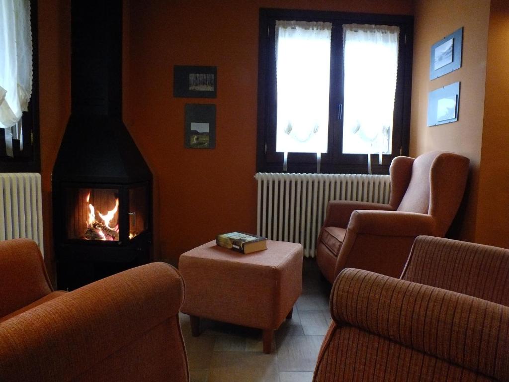 Posezení v ubytování Hotel Areulo