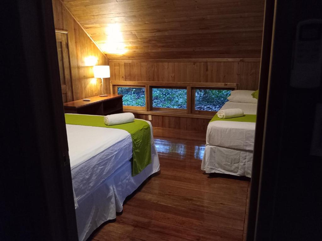 Cama ou camas em um quarto em Punta Bonita