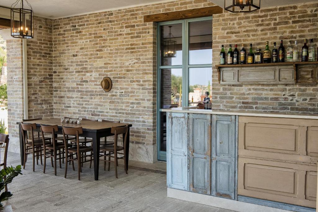 a dining room with a table and chairs at Villa Sant'Angelo in Alba Adriatica