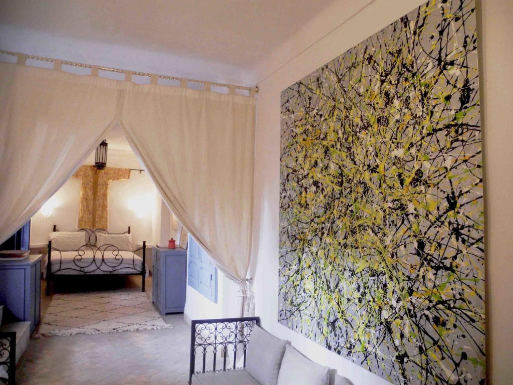 Postel nebo postele na pokoji v ubytování Riad Linda