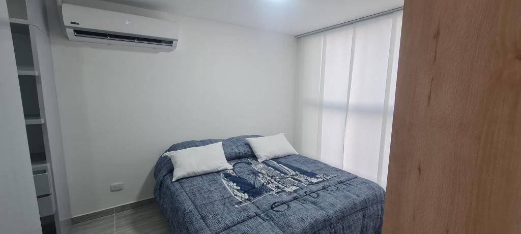 Postel nebo postele na pokoji v ubytování Hermoso y confortable apartamento