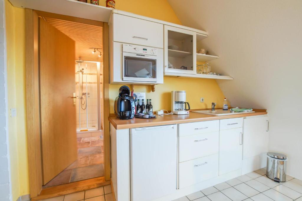 Kuchyň nebo kuchyňský kout v ubytování Pension Lindenkrug