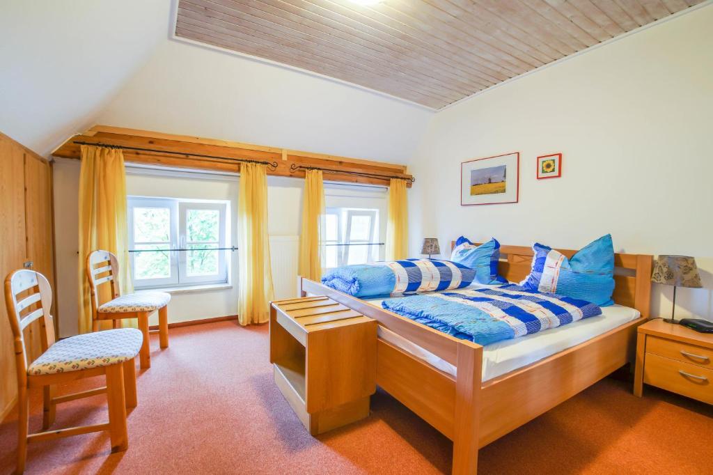 Postel nebo postele na pokoji v ubytování Pension Lindenkrug