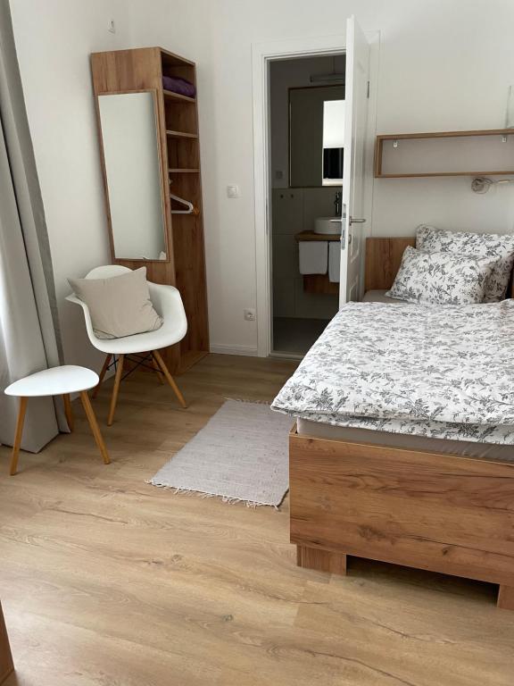 Postel nebo postele na pokoji v ubytování Aurelia Rooms
