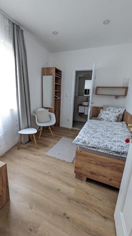 Postel nebo postele na pokoji v ubytování Aurelia Rooms