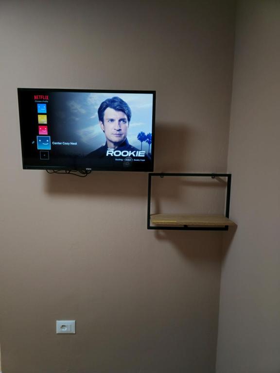 TV a/nebo společenská místnost v ubytování Center Cozy Nest