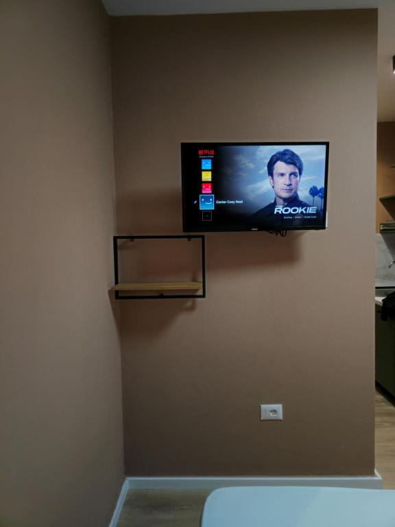 TV a/nebo společenská místnost v ubytování Center Cozy Nest