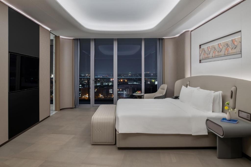 Posezení v ubytování Vignette Collection The Xanadu Guangzhou, an IHG Hotel