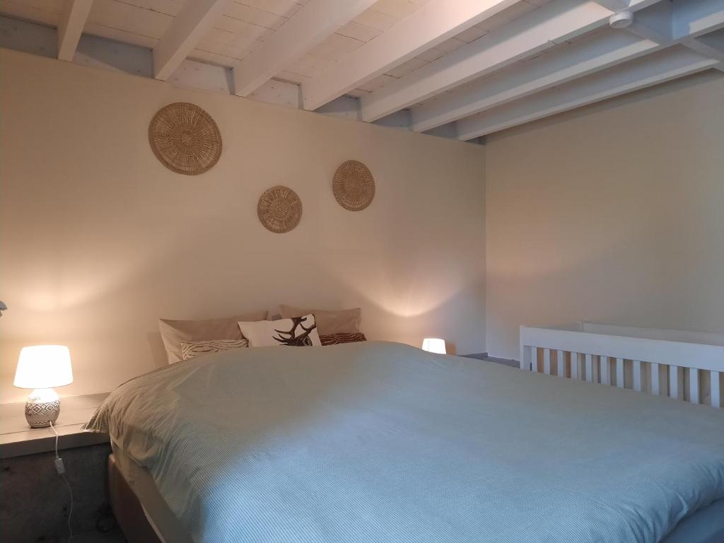 Postel nebo postele na pokoji v ubytování koekoelavache holiday home
