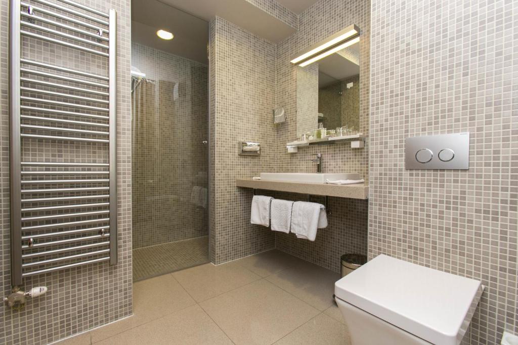 Koupelna v ubytování Art Hotel Kalelarga