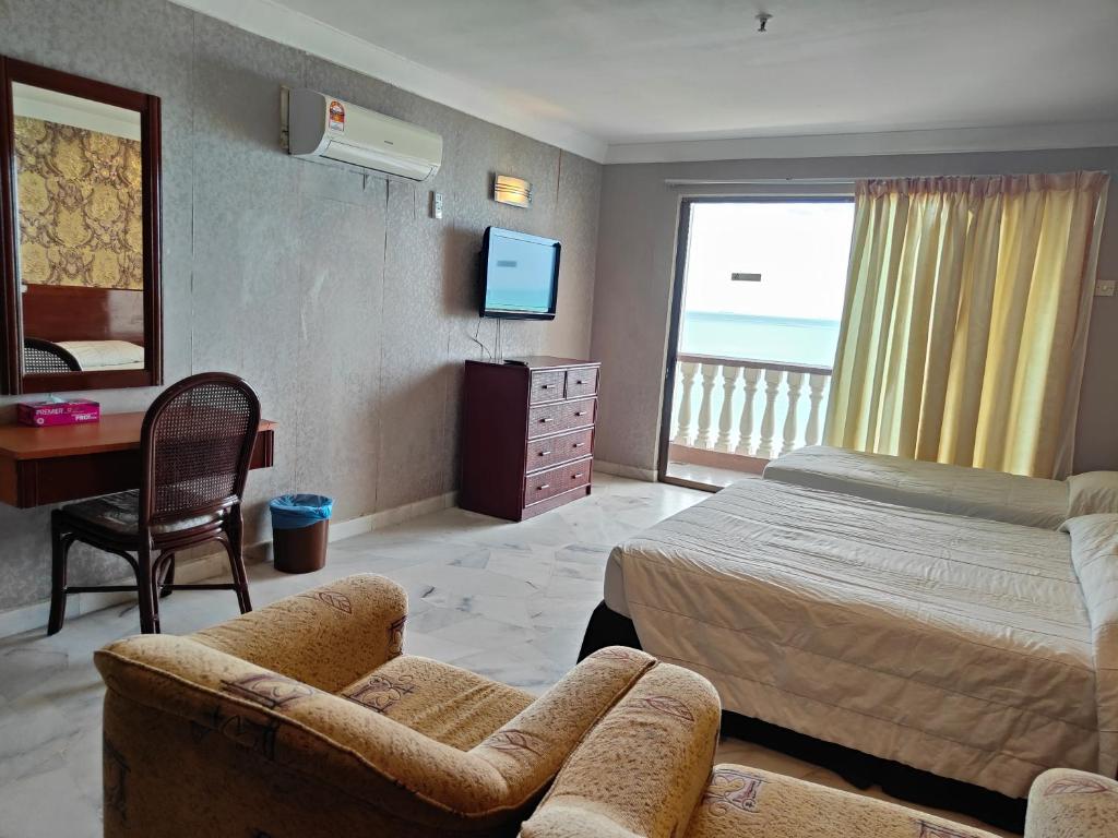 Postel nebo postele na pokoji v ubytování BAYU BEACH RESORT
