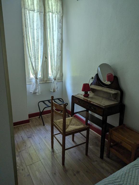 Posezení v ubytování Auberge Des Pins
