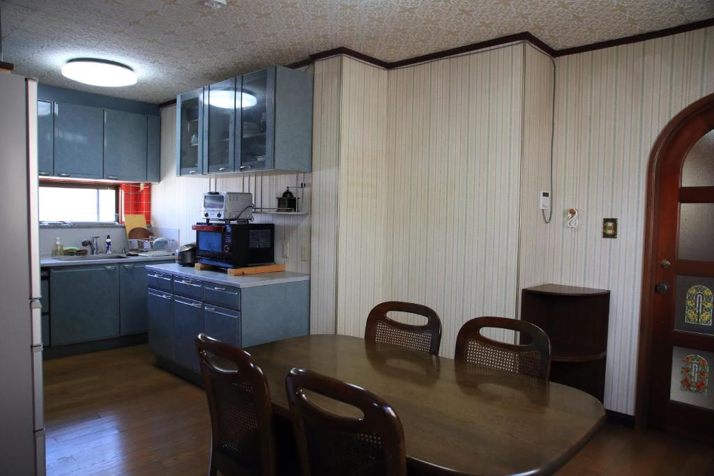 Kuchyň nebo kuchyňský kout v ubytování 上田屋　半田館