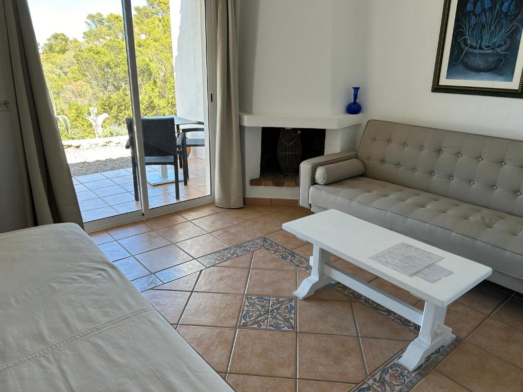 Posezení v ubytování Hostal Cala Moli