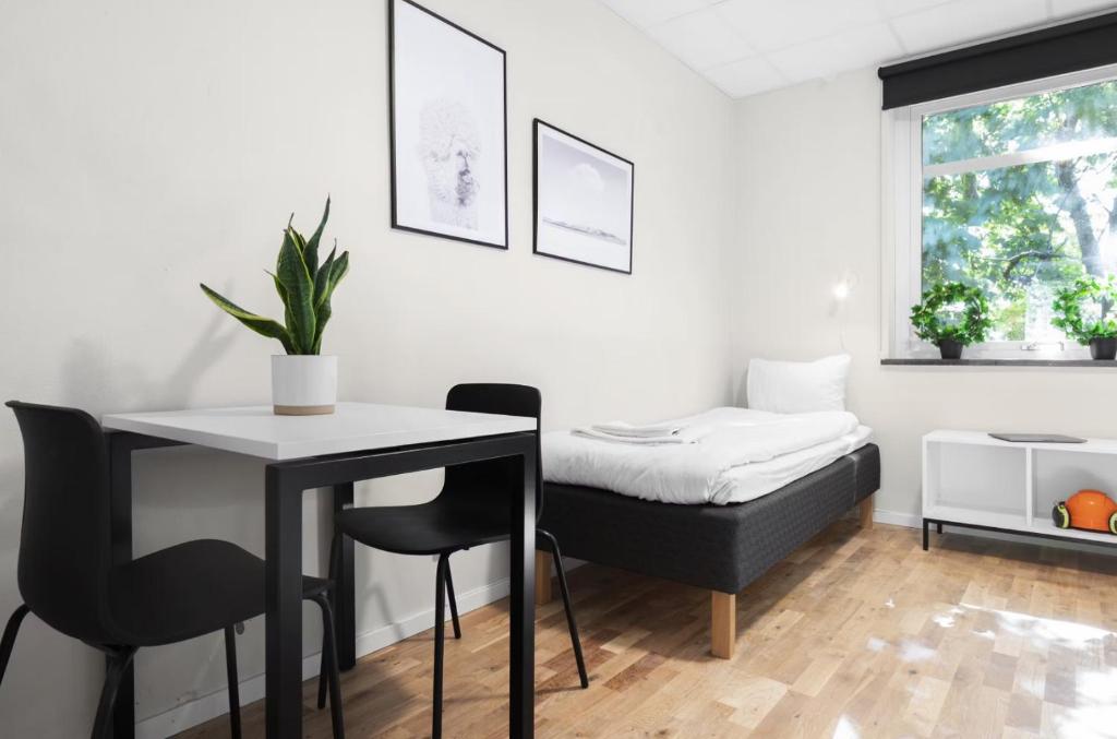 Postel nebo postele na pokoji v ubytování Forenom Hostel Lund Örtofta