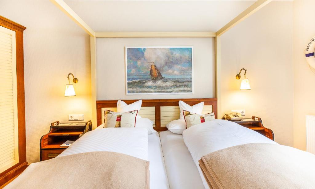Postel nebo postele na pokoji v ubytování Hotel Friese-up AnnerSiet-