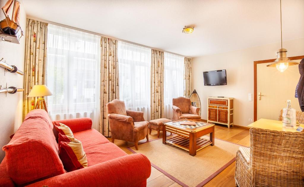 TV a/nebo společenská místnost v ubytování Hotel Friese-up AnnerSiet-