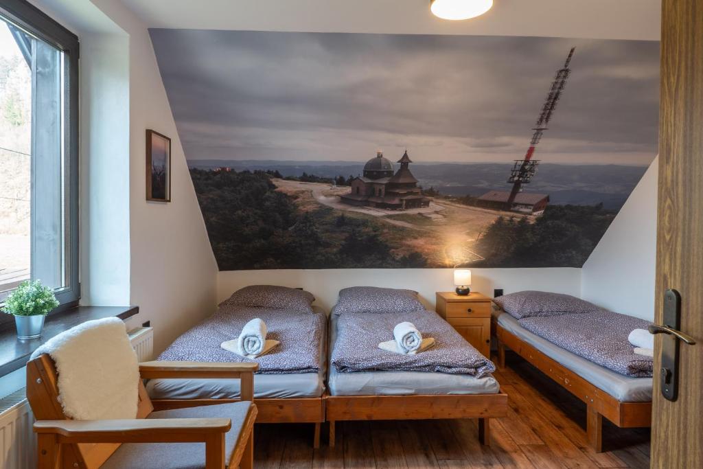 Postel nebo postele na pokoji v ubytování Koliba Pod Horů