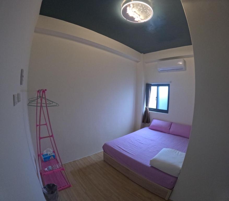 Postel nebo postele na pokoji v ubytování sky blue hostel