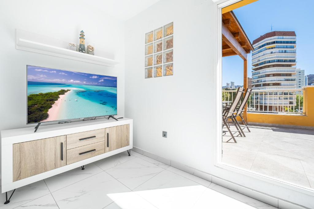 TV a/nebo společenská místnost v ubytování Penthouse Ancla 561 Levante Beach