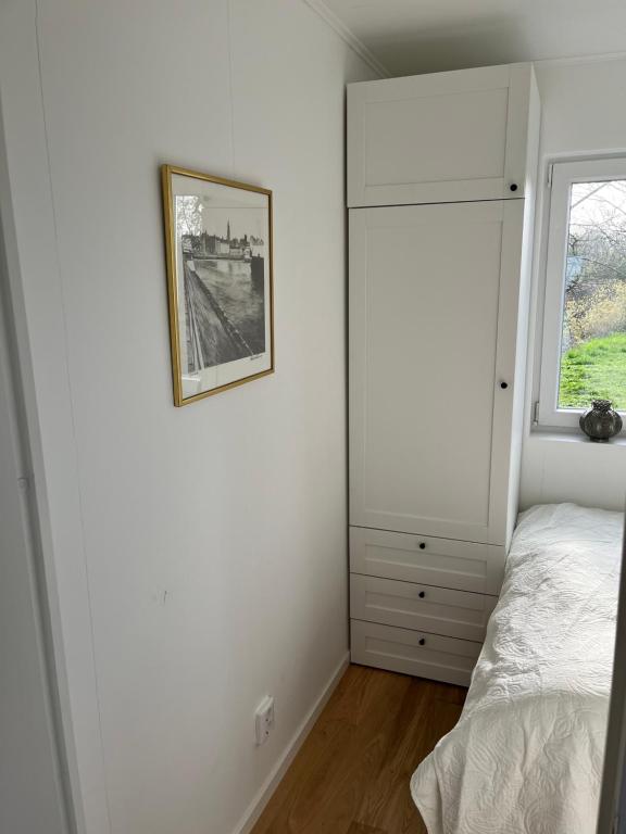 Postel nebo postele na pokoji v ubytování House of Niagara