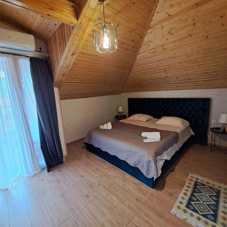Postel nebo postele na pokoji v ubytování Davit batoni Guest house