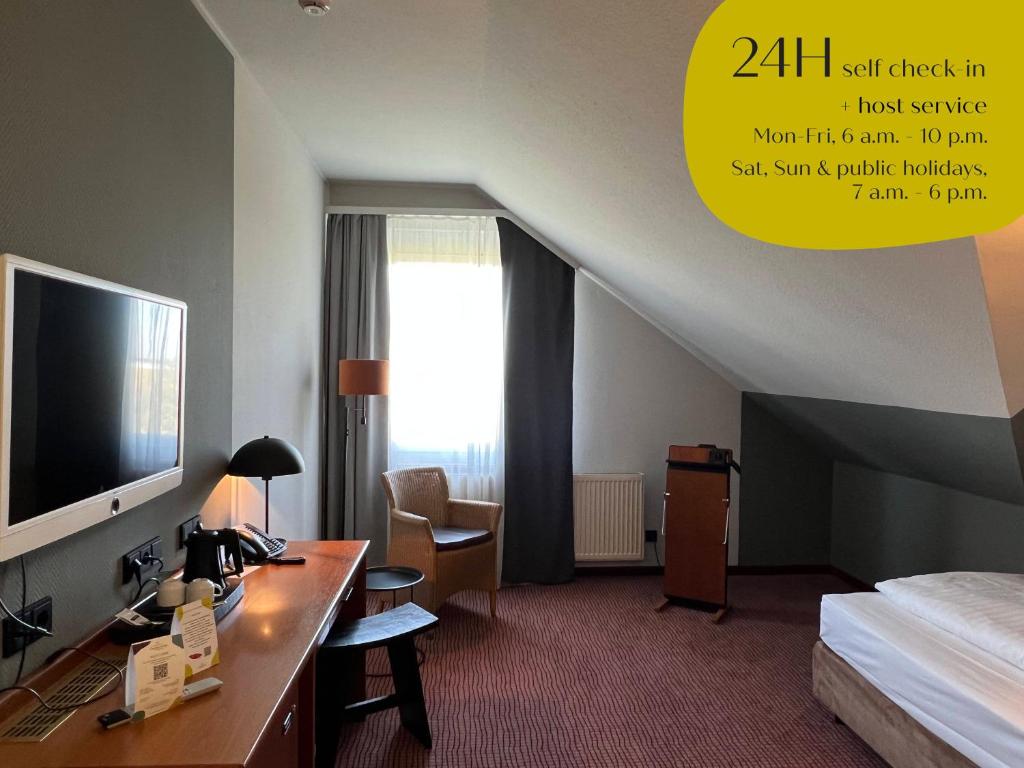 TV a/nebo společenská místnost v ubytování Classik Hotel Magdeburg