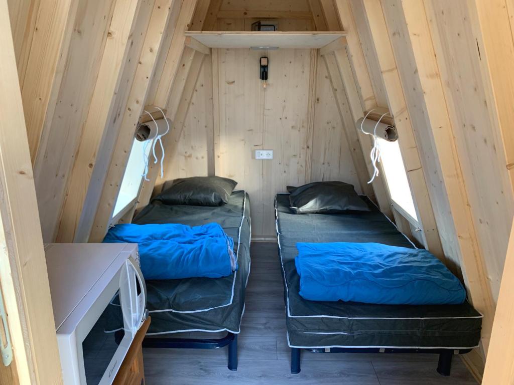Cama ou camas em um quarto em Camping Bel Air Bordeaux