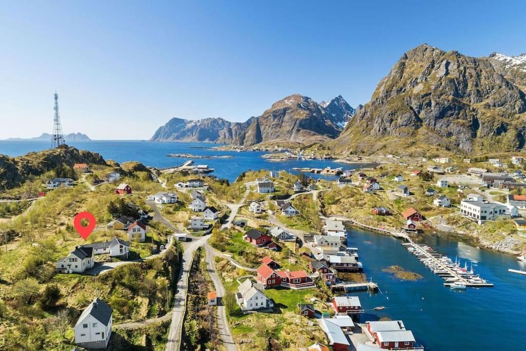 an aerial view of a small village on a mountain at Panorama X Apartment 5 min from Reine, Hamnøy and Bodø ferry in Moskenes