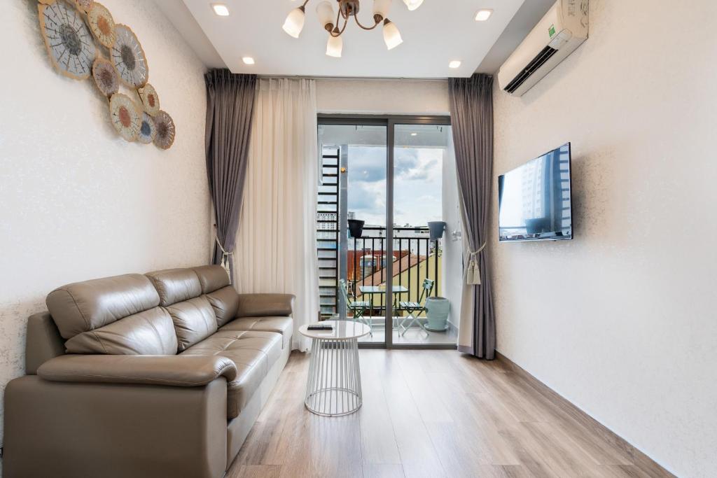 Posezení v ubytování Double E SaiGon Apartment in Rivergate Building