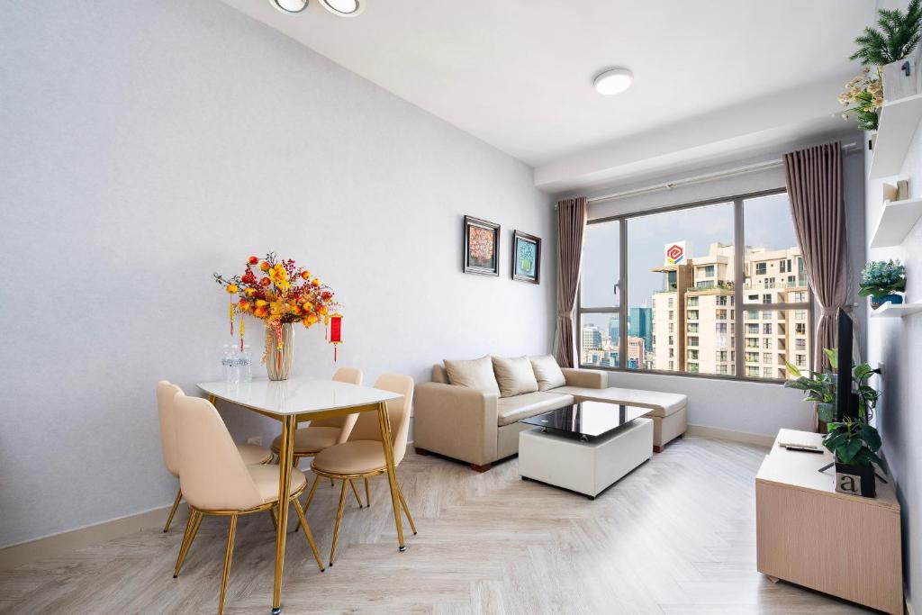 Posezení v ubytování Double E SaiGon Apartment in Rivergate Building