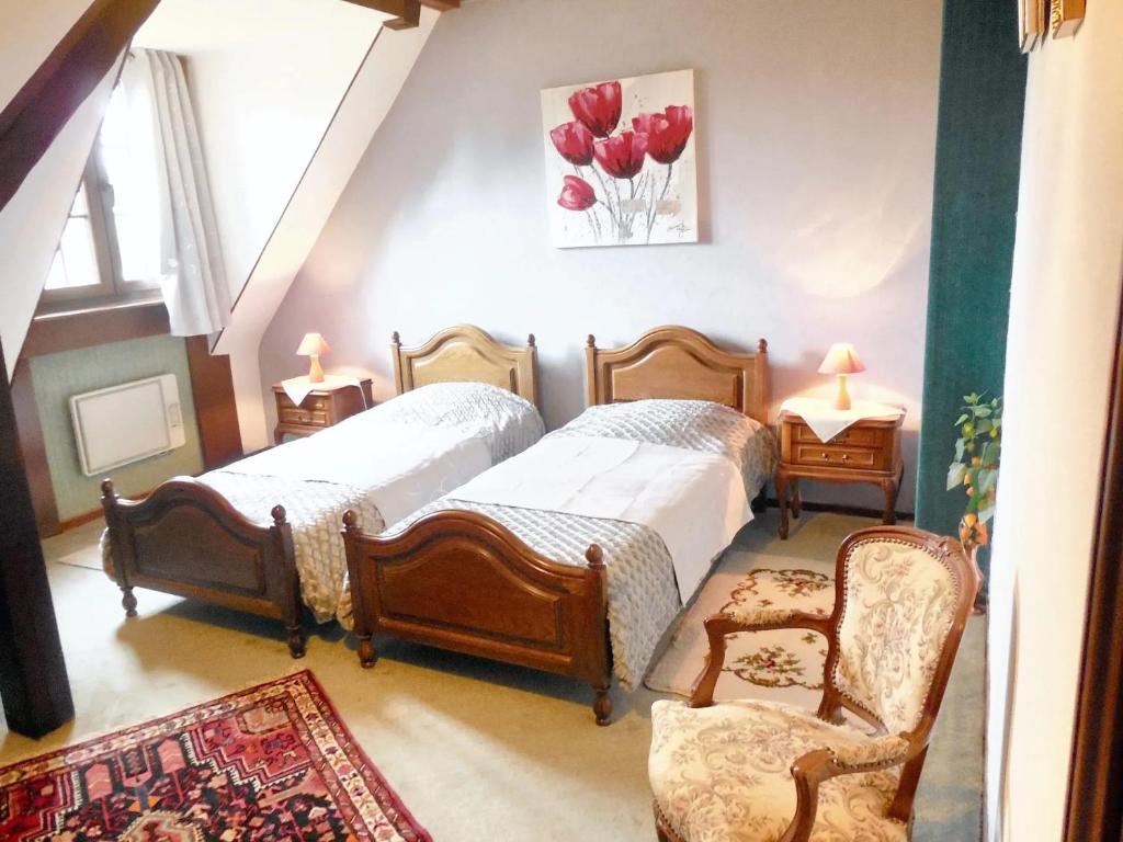 Postel nebo postele na pokoji v ubytování Appartement de 2 chambres avec jardin clos et wifi a Hochfelden